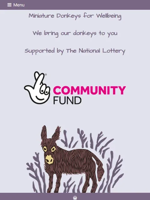 The social enterprise website for Miniature Donkeys for Wellbeing shown on a tablet
